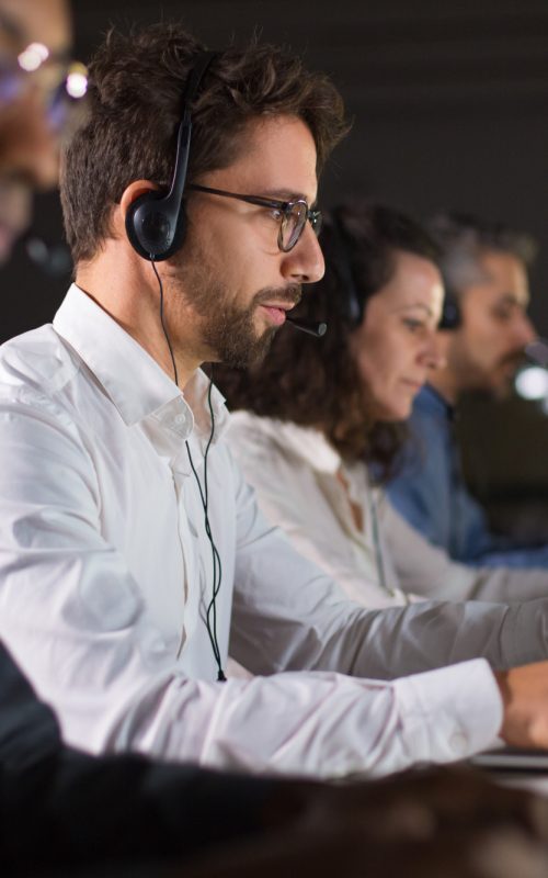 confident-call-center-operator-talking-with-client